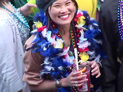 Amateur slut flashes her tits during a carnival in the street