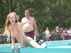 Flirtatious cowgirl with natural tits performs a wild striptease show outdoors