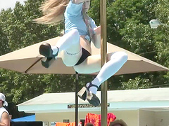 Flirtatious cowgirl with natural tits performs a wild striptease show outdoors