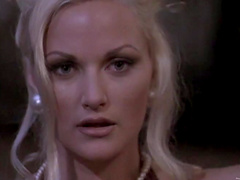 Erotic blonde with kinky hair bathing her big natural tits in a soapy shower