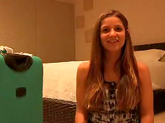 Amateur unbuttons her dress and models her perky tits