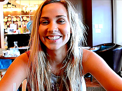 A pretty blonde with dimples flashes her tits during an interview